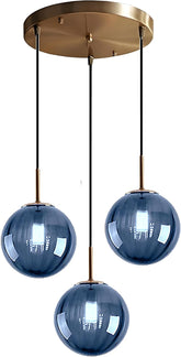 Modern pendant light with three blue glass shades and gold accents.